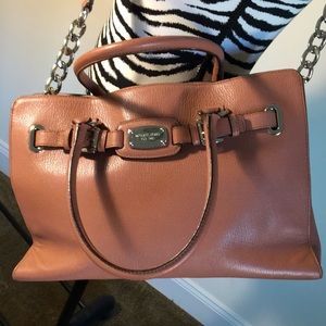 MK Tan leather satchel bag with shoulder strap.